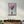 Blooming Heart glass wall art by Artdesigna featuring a romantic urban design with vibrant colors and intricate details.