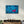 A Standout Among the Blue | Glass Wall Art - Artdesigna