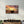 Fishing Boat at Sunset | Glass Wall Art - Artdesigna