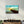 Kayak and Sunset on the Beach | Glass Wall Art - Artdesigna