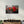 Red Peppers and Sauce | Glass Wall Art - Artdesigna