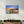 Muizenberg beach huts wooden cabins at twilight in Cape Town South Africa | Glass Wall Art - Artdesigna
