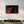 The Evil Behind The Red | Glass Wall Art - Artdesigna