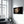 Leopard’s Silent Vigil | Glass Wall Art - Artdesigna